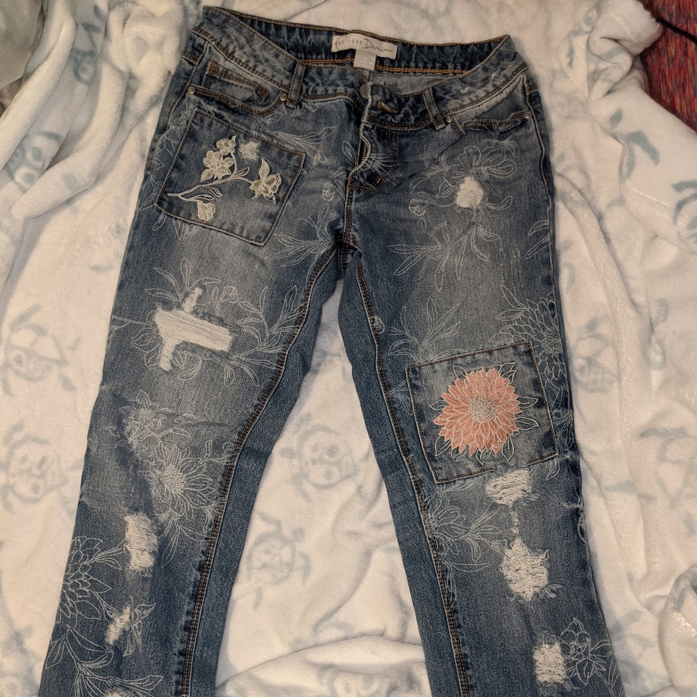 Blue jeans with floral designs